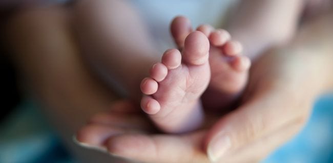 Woman holding baby