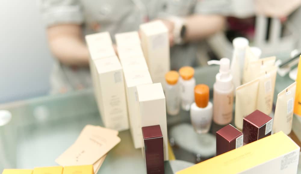 Lineup of different skin creams and cosmetics