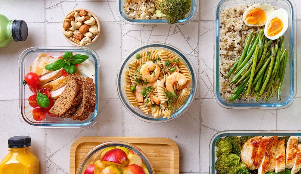 Healthy meals in glass dishes.